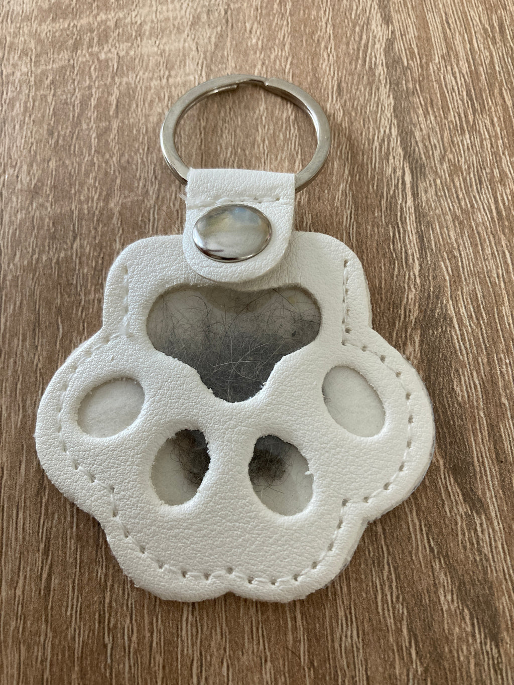 Porte-clés patte blanche Souvenir de chat